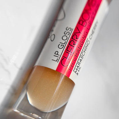 Color changing lip gloss that changes with your unique pH, "Cherry Bomb by Lather and Soul