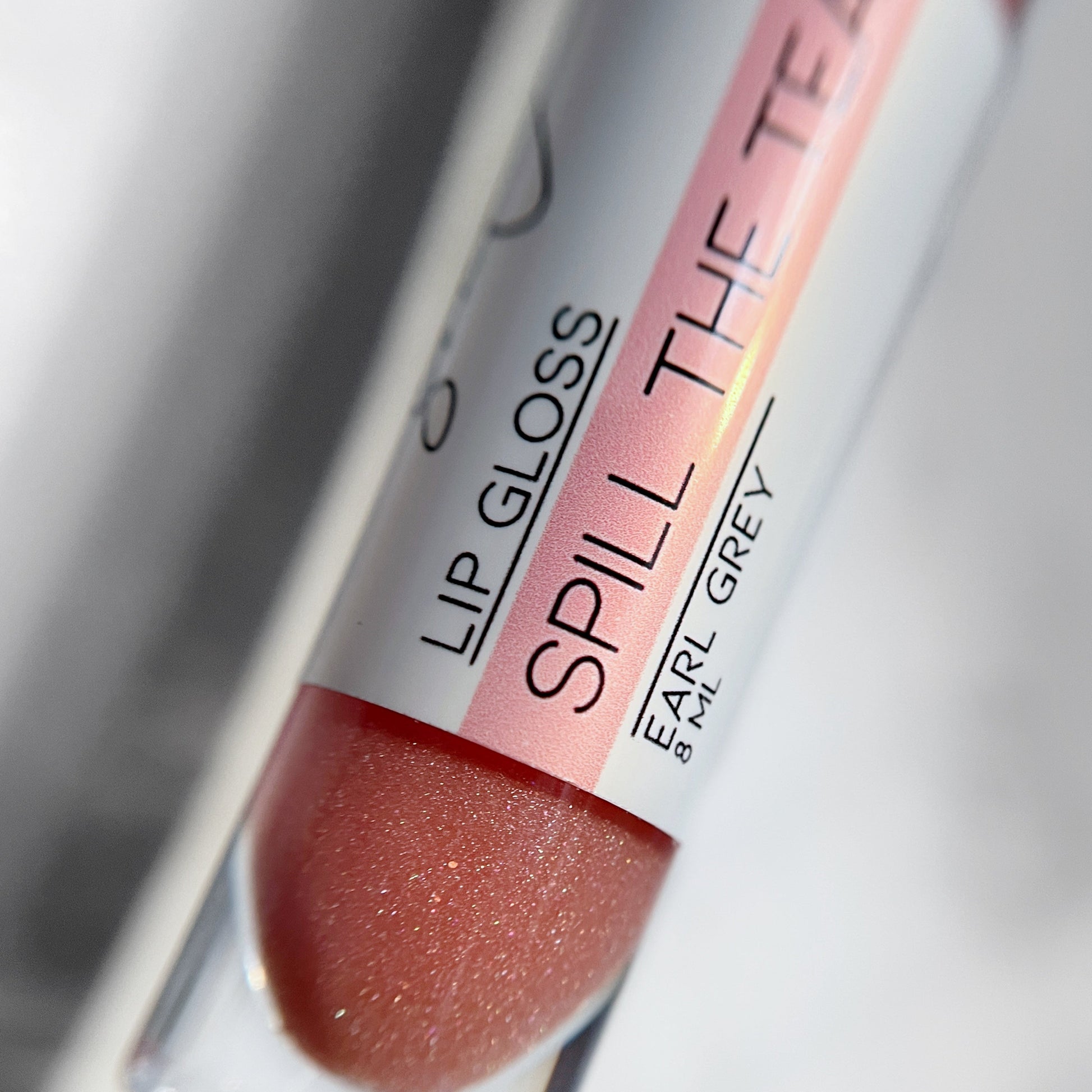 Sheer pink lip gloss, "Spill the Tea" by Lather and Soul, wear alone or over your favorite lip color!